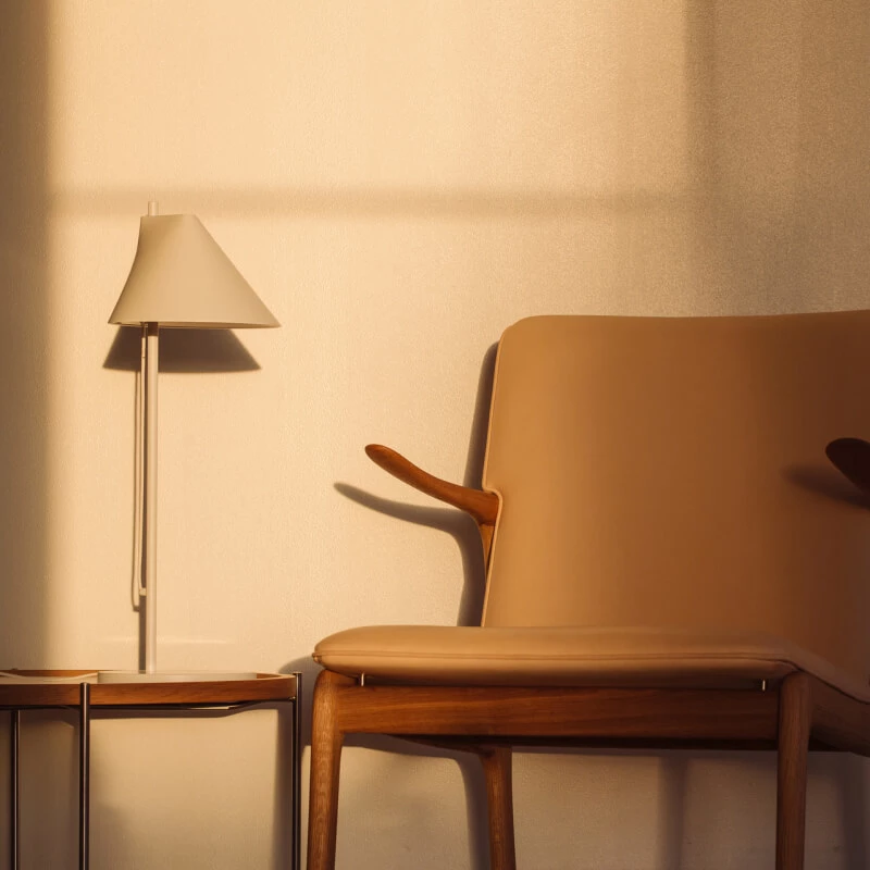 The Yuh Table from Louis Poulsen in a living room.