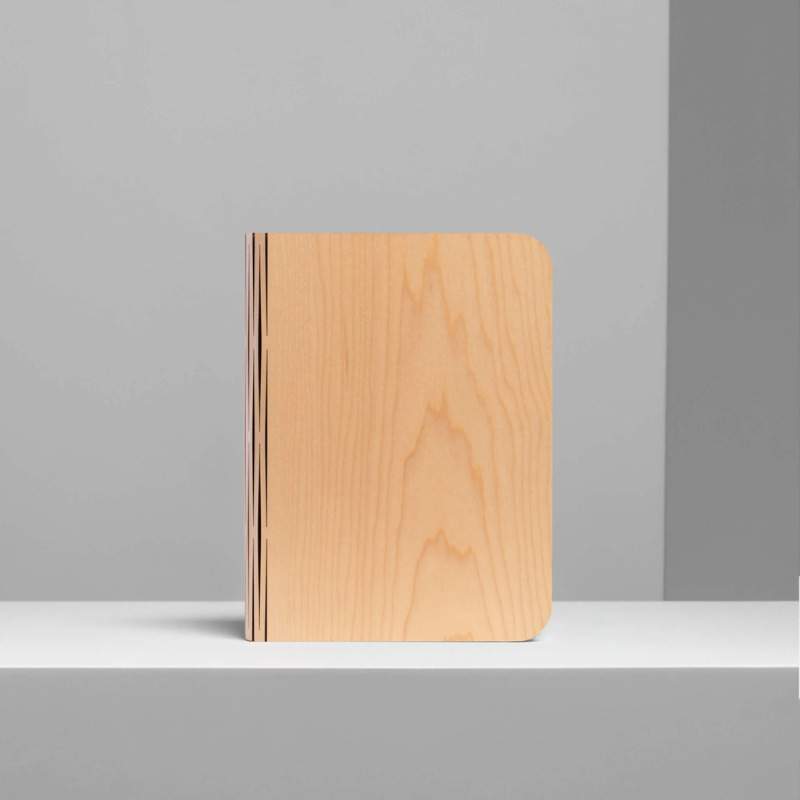 The Lito Classic Wood from Lumio in maple in a photo booth.