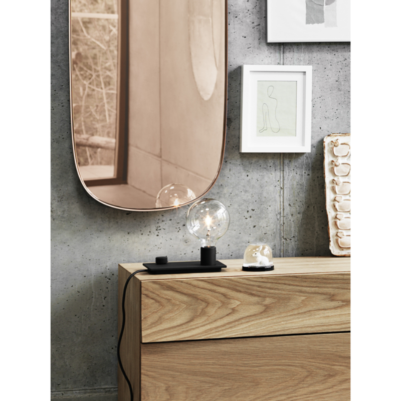 The Reflect Sideboard from Muuto in a den.