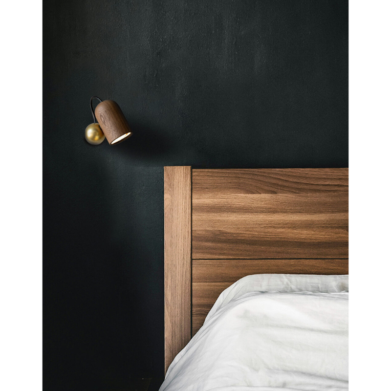 The Onfa Wall Lamp from Nomon in a bedroom.