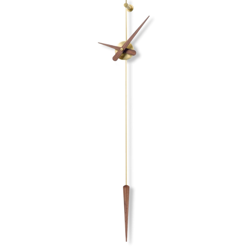 The Punto y Coma Clock from Nomon in polished brass and walnut.