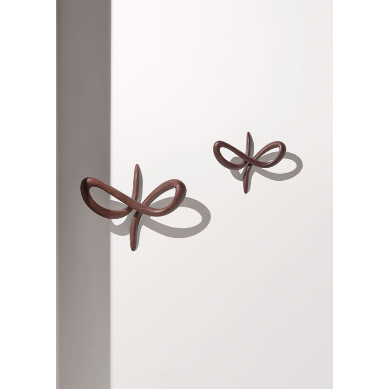 The Vertigo Wall Hanger from Nomon in an image showing both sizes.