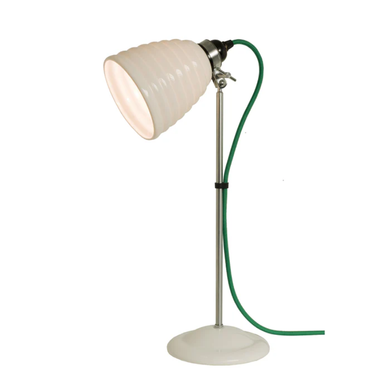 The Hector Bibendum Table Light from Original BTC in green in a studio.