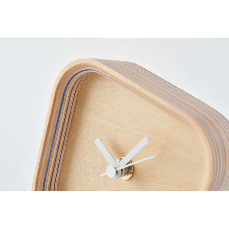 The Rotation Clock from Plywood Laboratory in blue in a close up.