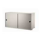 The Cabinet with Sliding Doors from String Furniture in the 11.8 inch depth size and beige color.