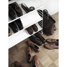 The Shoe Shelves from String Furniture in a family space.