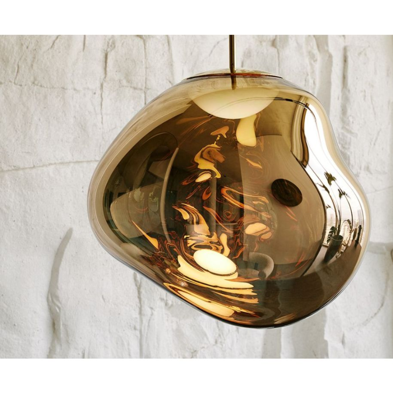 The Melt Pendant from Tom Dixon in a living room.