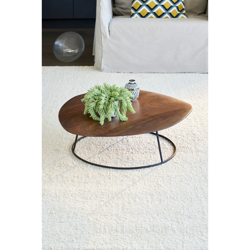 The Astrakan Neige Wool Rug from Toulemonde Bochart in a living room.