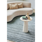 The Glam Banana Fiber Rug from Toulemonde Bochart in a lounge.