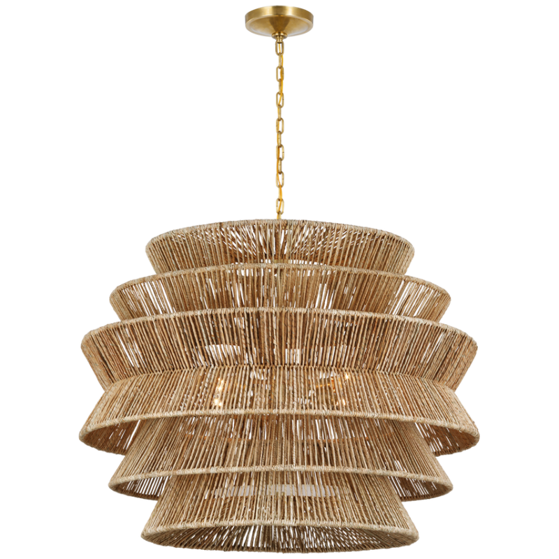 The Antigua Drum Chandelier from Visual Comfort & Co. XL size in antique burnished brass and abaca.