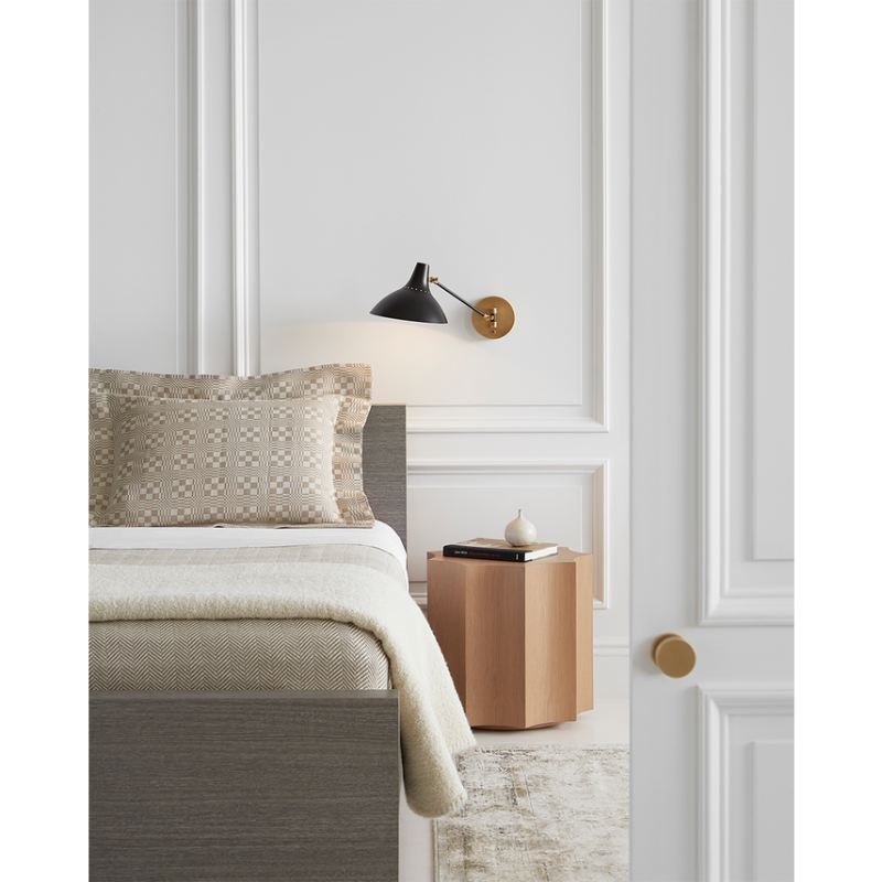 The Charlton Wall Light from Visual Comfort & Co in a bedroom.