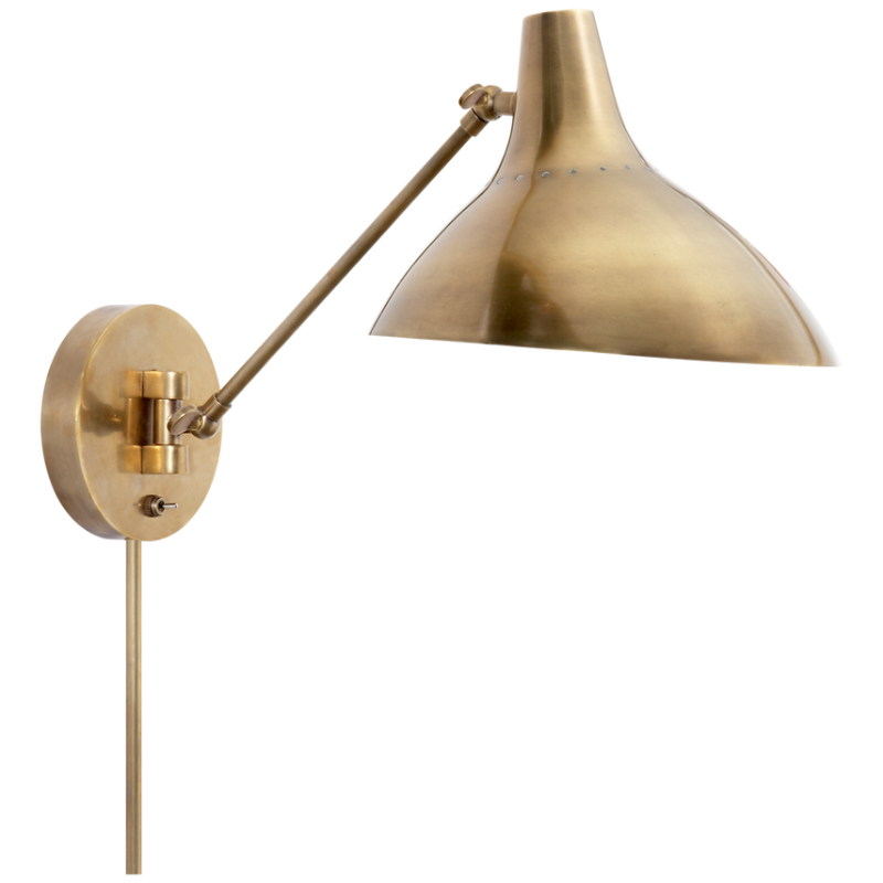 The Charlton Wall Light from Visual Comfort & Co in hand-rubbed antique brass.