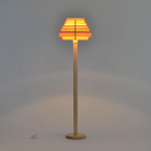 The Jakobsson Floor Lamp from Yamagiwa lit in a studio.