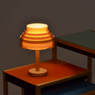 The Small Jakobsson Table Lamp from Yamagiwa in a living room turned on.