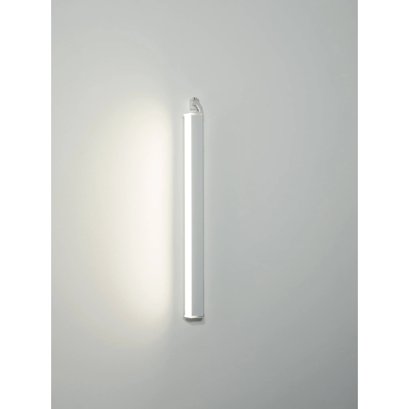 The Pencil Light - Vertical Wall Mount from Zafferano in a studio.