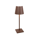 The Poldina Pro L Desk Lamp from Zafferano in rust.