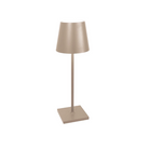 The Poldina Pro L Desk Lamp from Zafferano in sand.