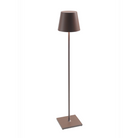 The Poldina Pro XXL Floor Lamp from Zafferano in rust.