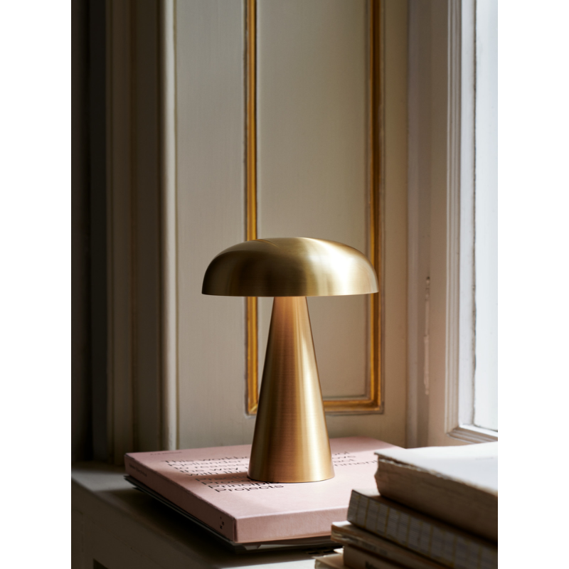 The Como SC53 from &Tradition in brass in a lounge.