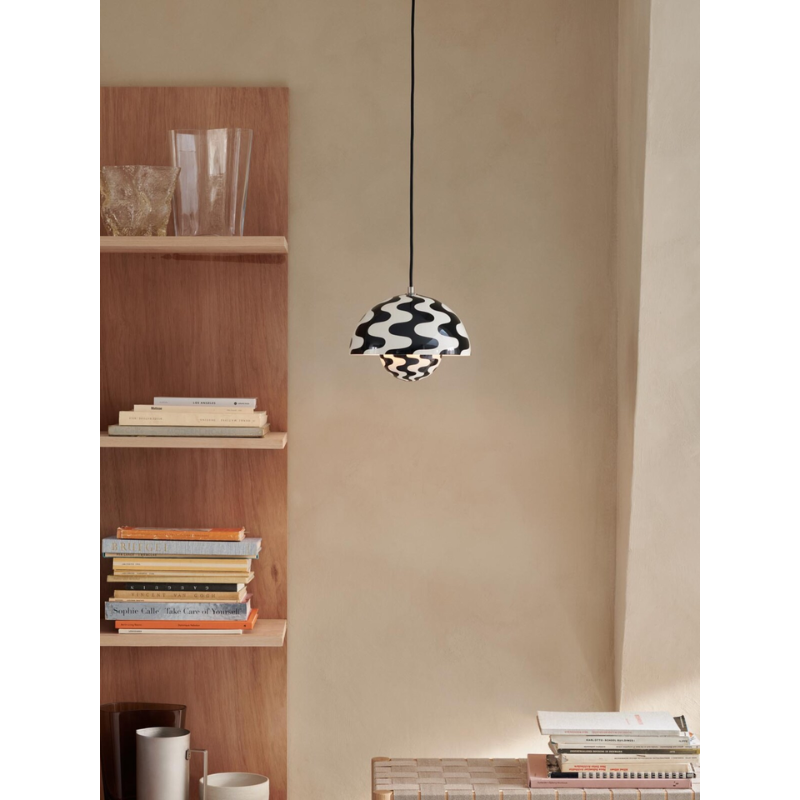 The Flowerpot VP1 Pendant from &Tradition in a living room.