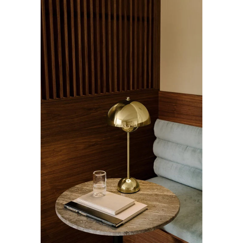 The Flowerpot VP3 Table Lamp from &Tradition in a cafe.