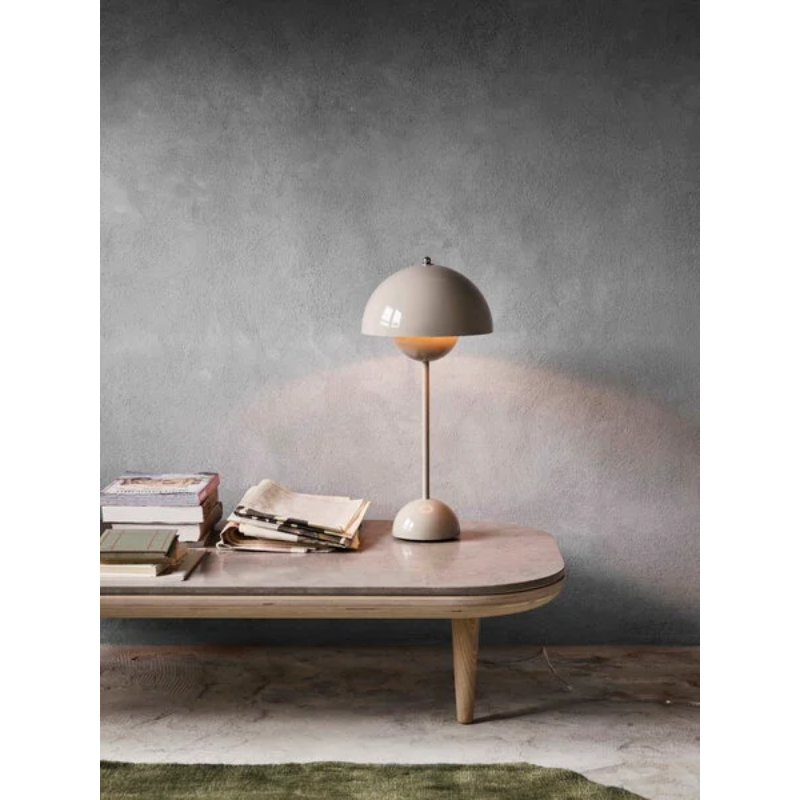 The Flowerpot VP3 Table Lamp from &Tradition in a lounge.