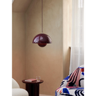 The Flowerpot VP7 Pendant from &Tradition in a bedroom.