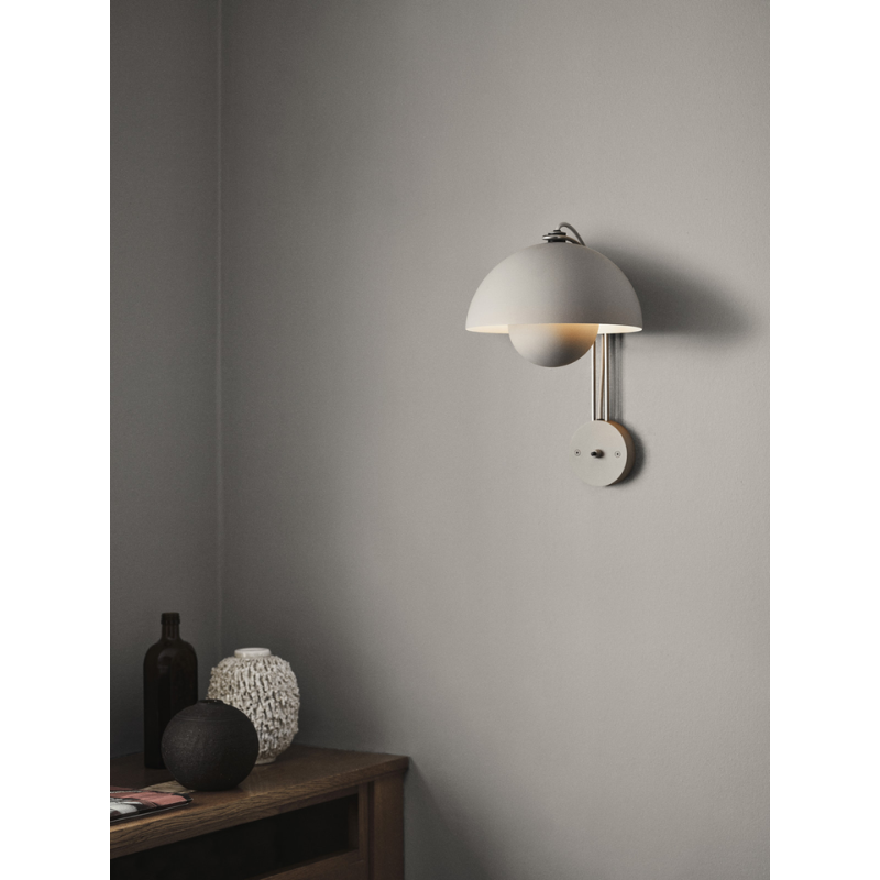 The Flowerpot VP8 Wall Sconce from &Tradition in a den.