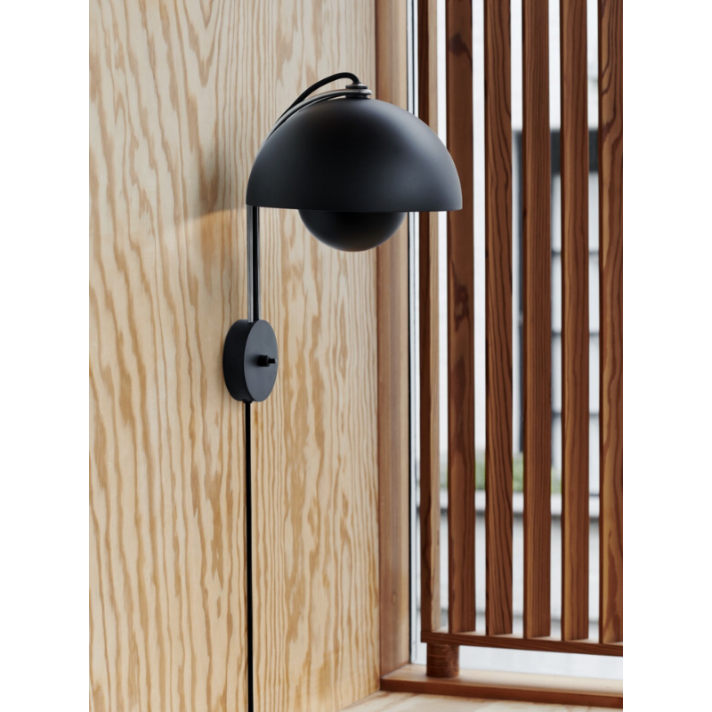 The Flowerpot VP8 Wall Sconce from &Tradition in a home.