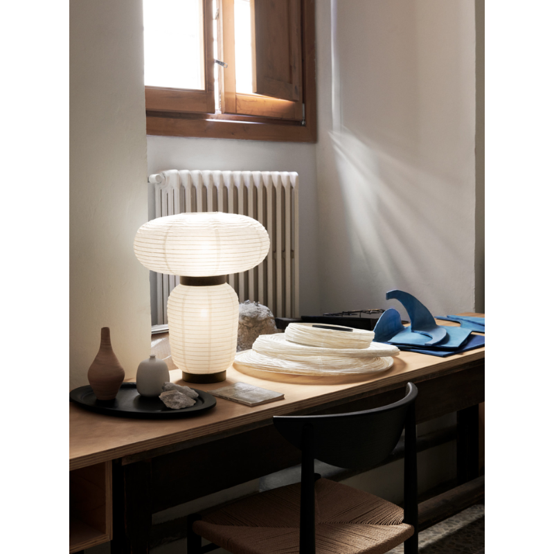 The Formakami JH18 Table Lamp from &Tradition in an office.