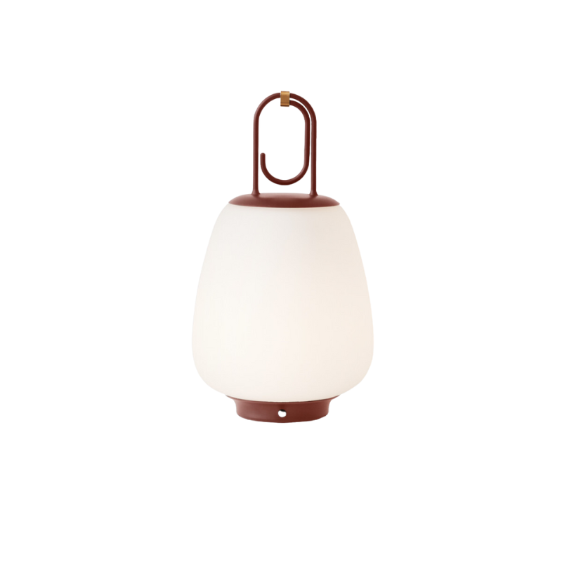 The Lucca Portable Lamp from &Tradition in maroon.