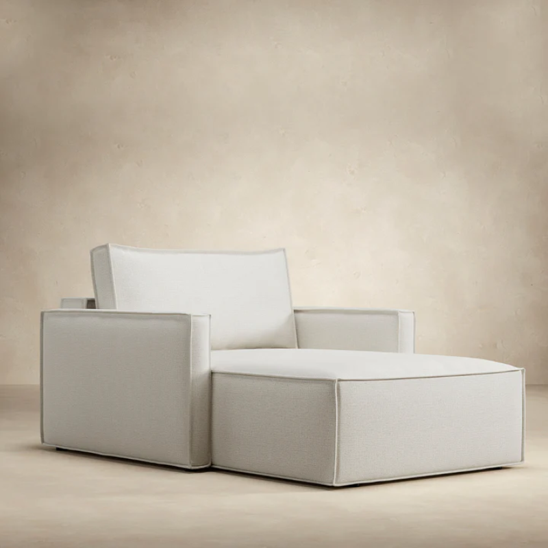 The Newilla Lounger Chair with thin arms in Adorati Fog 256