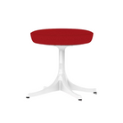 The Nelson Pedestal Stool from Herman Miller with crimson hopsak upholstery.