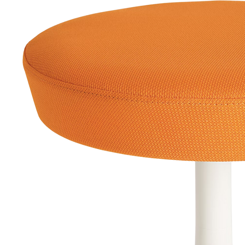 The Nelson Pedestal Stool from Herman Miller seat in orange hopsak upholstery.