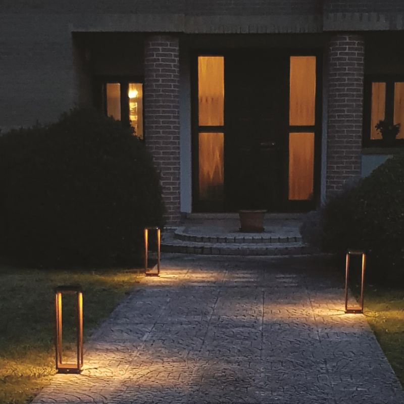 The Home Solar from Zafferano outdoors illuminating a pathway.