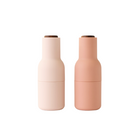 The Bottle Grinder from Audo Copenhagen in nude with walnut lid.