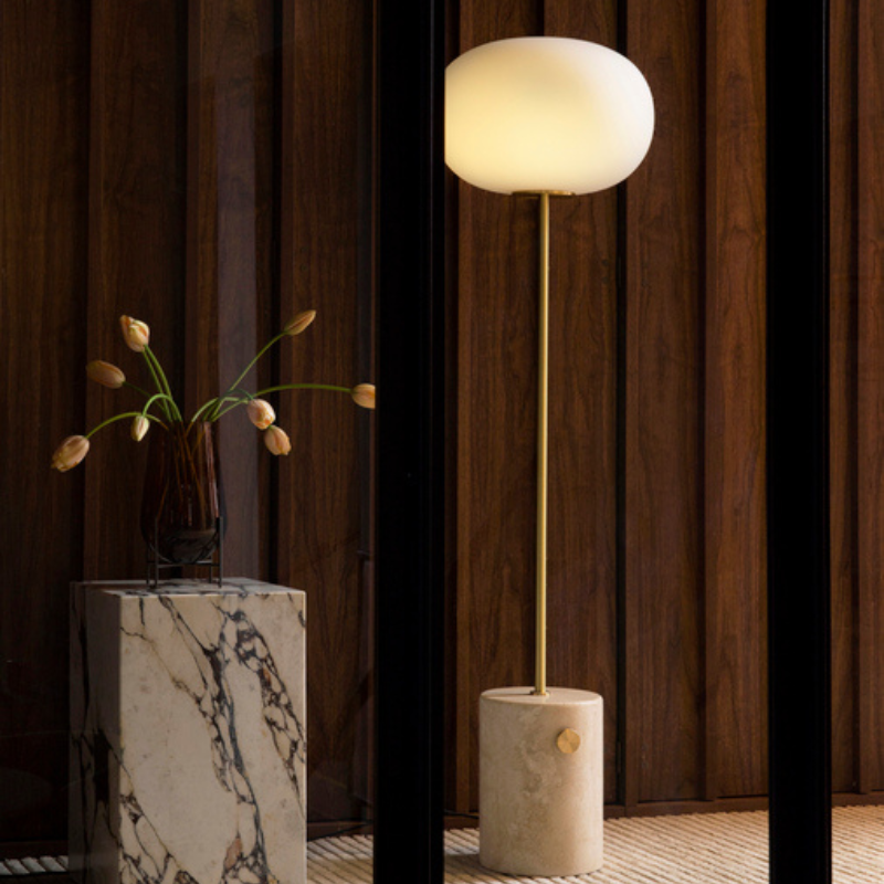 The JWDA Floor Lamp from Audo Copenhagen showcasing the lighting fixture.