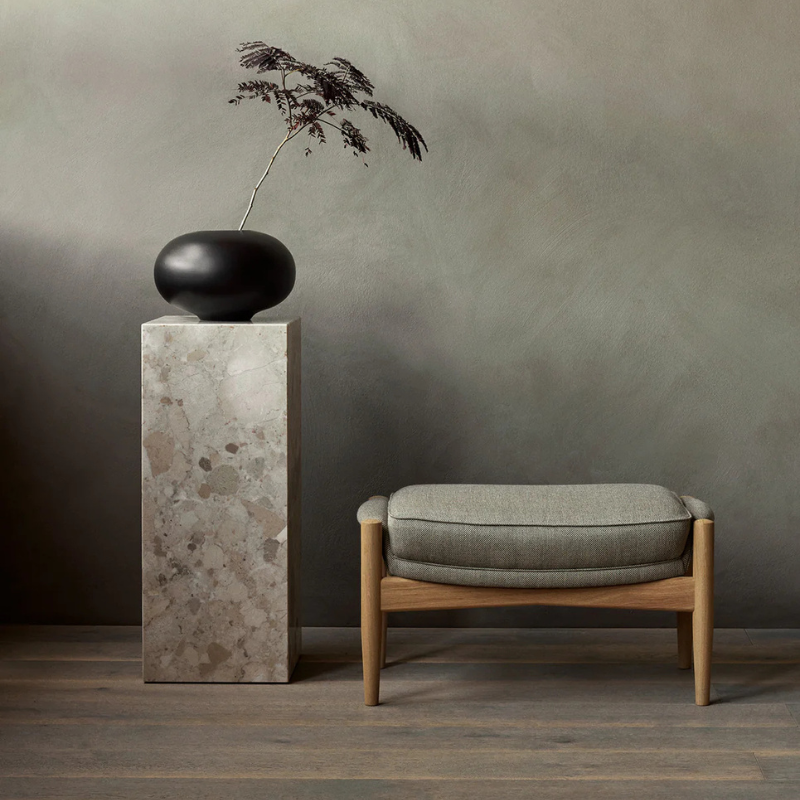 The Marble Plinth Pedestal from Audo Copenhagen used as a display stand.