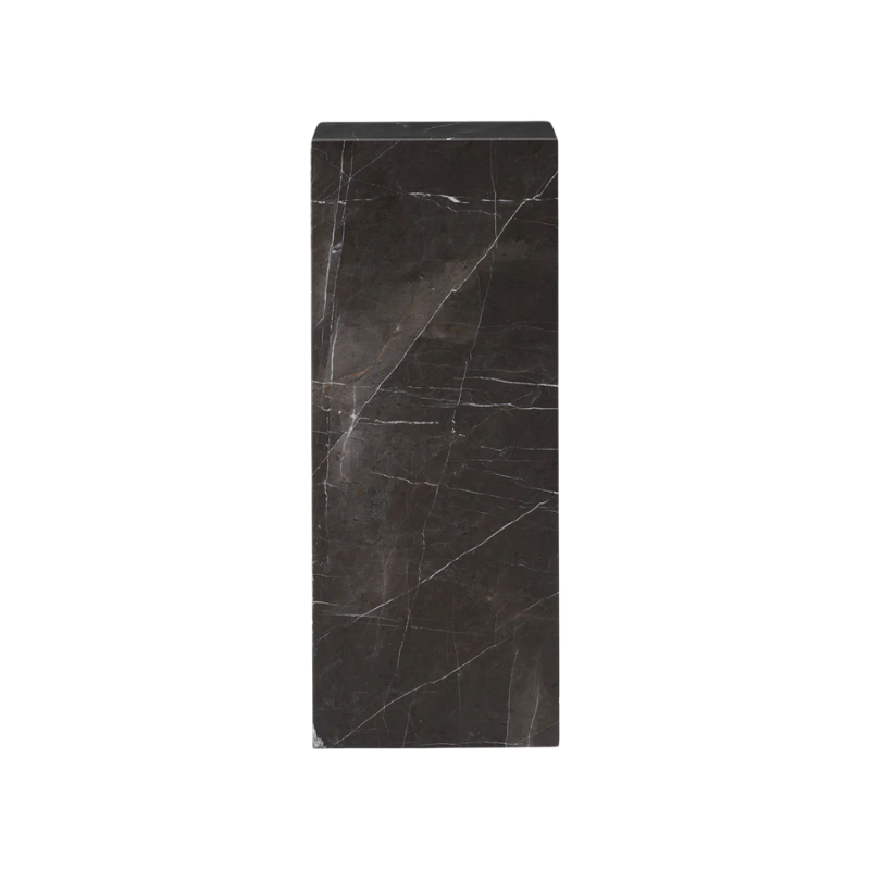 The Marble Plinth Pedestal from Audo Copenhagen made from grey kendzo marble.