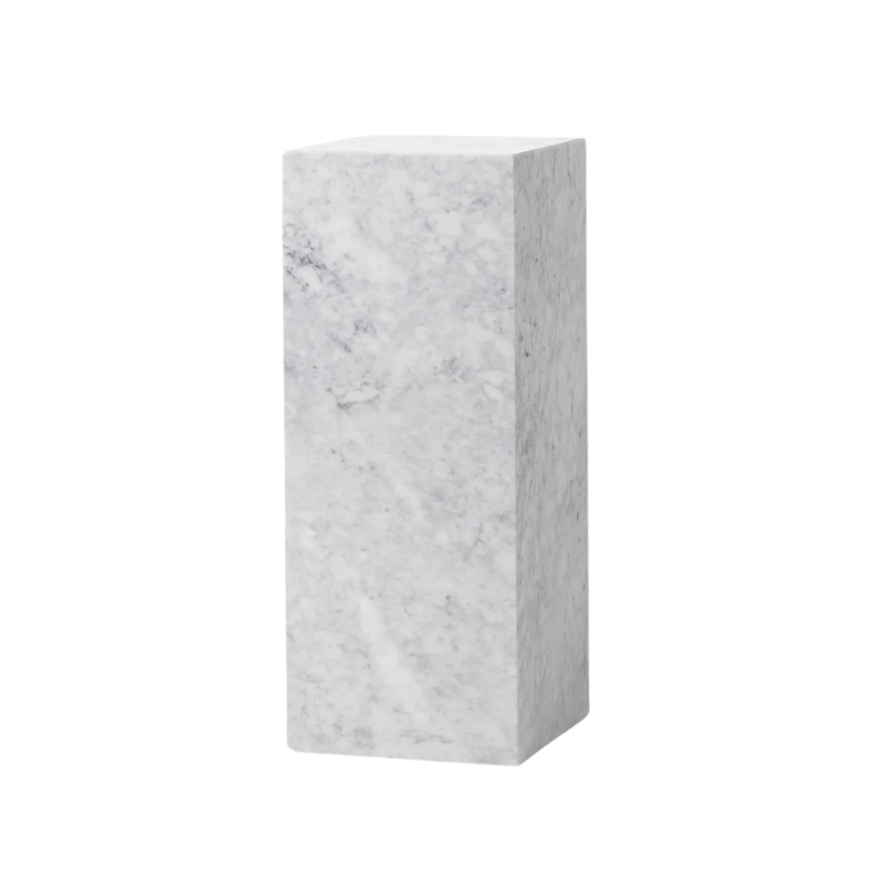 The Marble Plinth Pedestal from Audo Copenhagen made from white carrara marble corner.