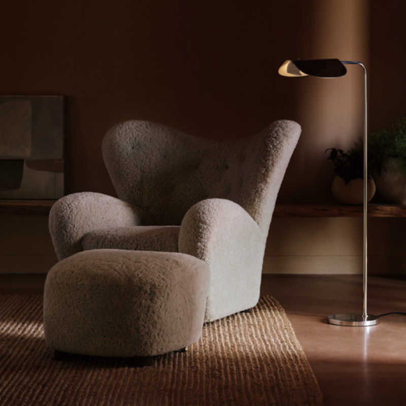 The Tired Man Sheepskin Lounge Chair from Audo Copenhagen in a lounge.