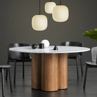 The 4/4 Round Dining Table from Blu Dot in a living room.