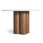 The 48 inch 4/4 Round Dining Table from Blu Dot with marble top and walnut base from the side.