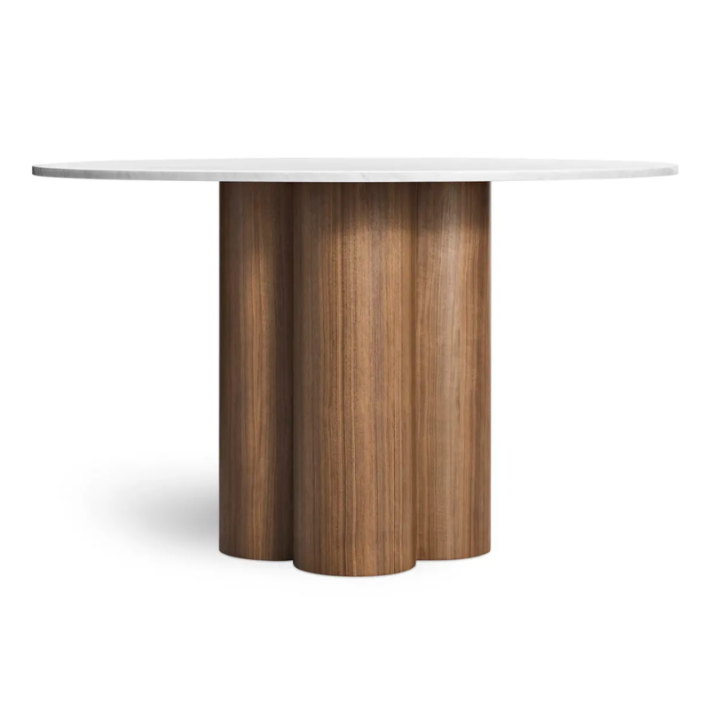 The 48 inch 4/4 Round Dining Table from Blu Dot with marble top and walnut base.