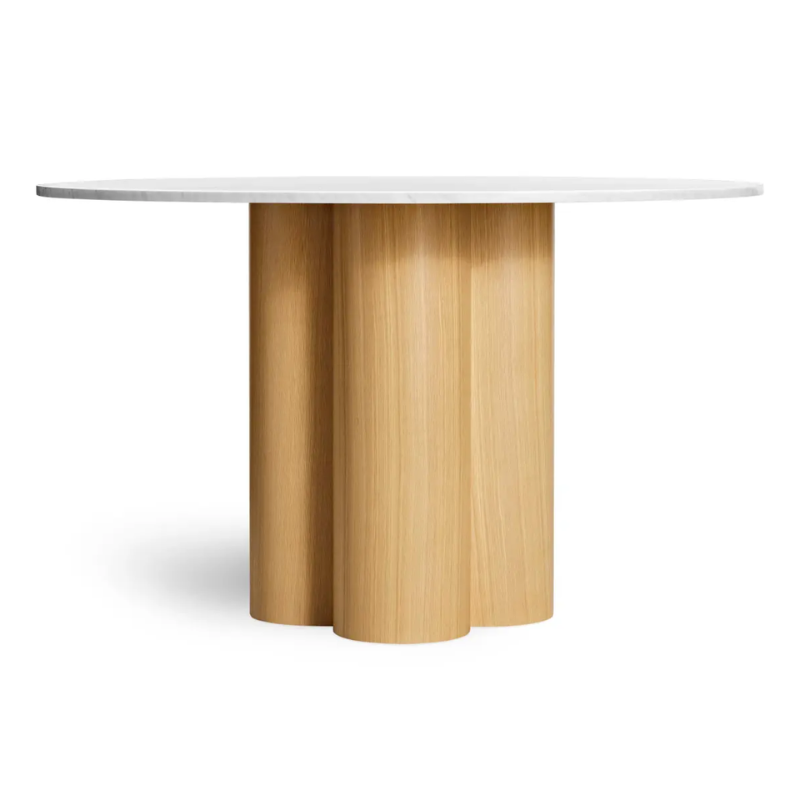 The 48 inch 4/4 Round Dining Table from Blu Dot with marble top and white oak base.