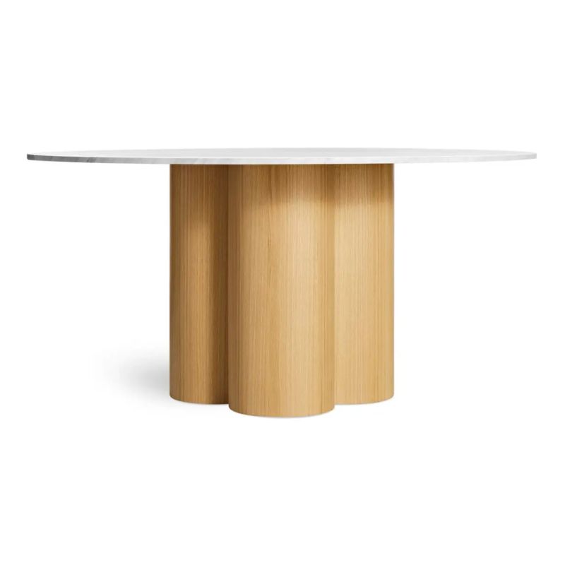 The 60 inch 4/4 Round Dining Table from Blu Dot with marble top and white oak base.