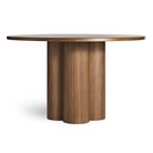 The 48 inch 4/4 Round Dining Table from Blu Dot in walnut.