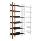 The Browser Tall Add-on Bookcase from Blu Dot with walnut uprights and oblivion shelving extension diagram from an angle.