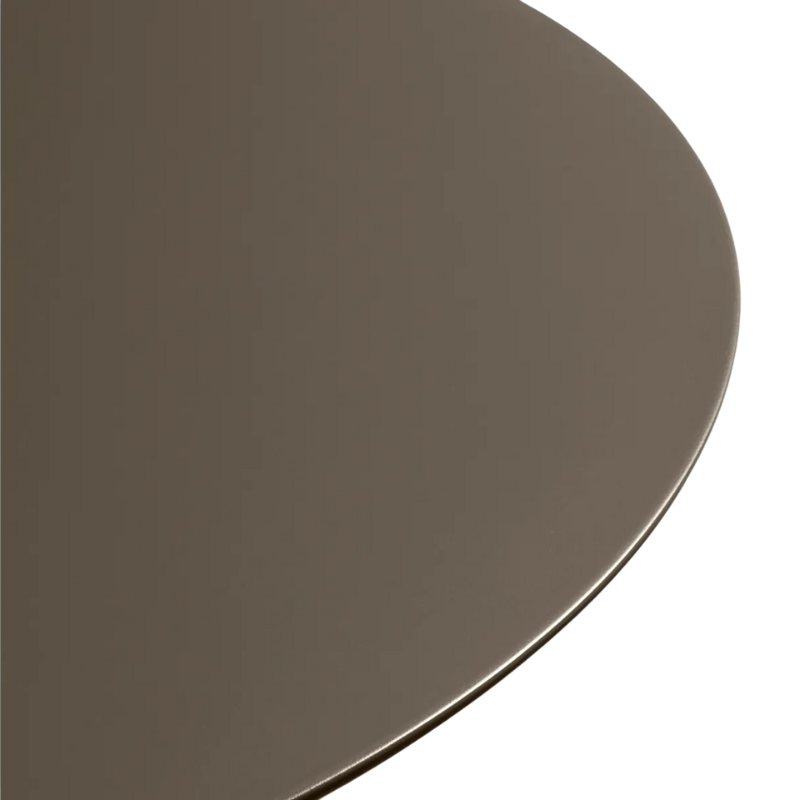 The Circula Low Cocktail Table from Blu Dot in dark olive in a close up.