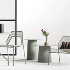 The Circula Tall Side Table from Blu Dot in a living room.